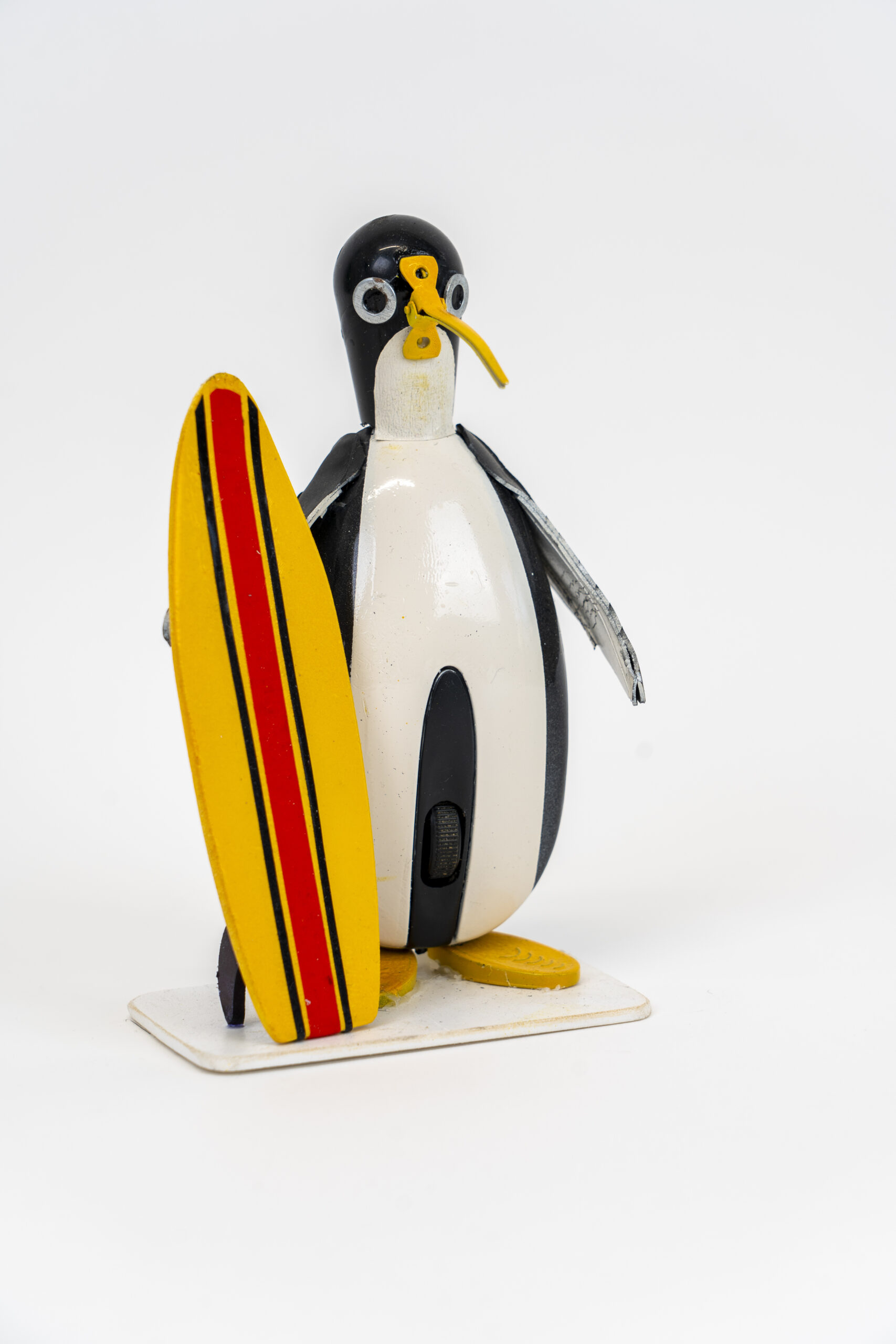 Pinguino surfista